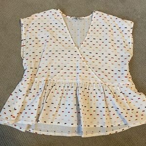 Madewell Blouse! Size Large! Crosses over in the front and has ruffle bottom!